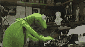Kermit la grenouille tapant frénétiquement à la machine